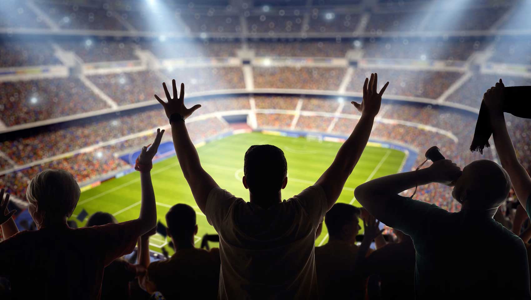 soccer fans cheering in large stadium